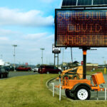 lighted sign near Walmart at University Town Centre